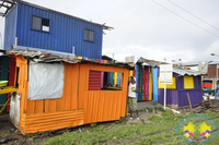 Mujeres por Buenaventura pintaron casas y negocios en sector maderero de El Piñal 