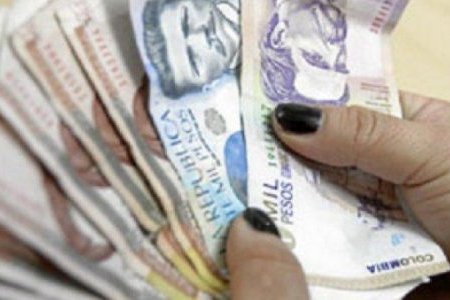 El salario mínimo de os colombianos para el 2021 será de $ 908.526 más el auxilio de transporte que quedó en $106.454