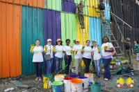 Mujeres por Buenaventura pintaron casas y negocios en sector maderero de El Piñal 